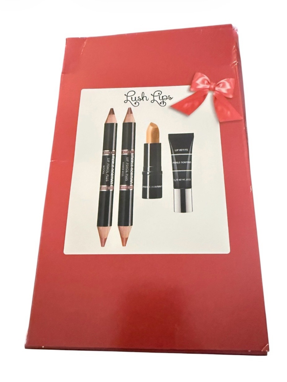 NIB Merle Norman Lush Lips set
2 Lip pencils 
1 Bullet lipstick 
1 Lip Revive